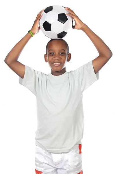 Αγόρι που κατέχουν μια μπάλα ποδοσφαίρου — Φωτογραφία Αρχείου