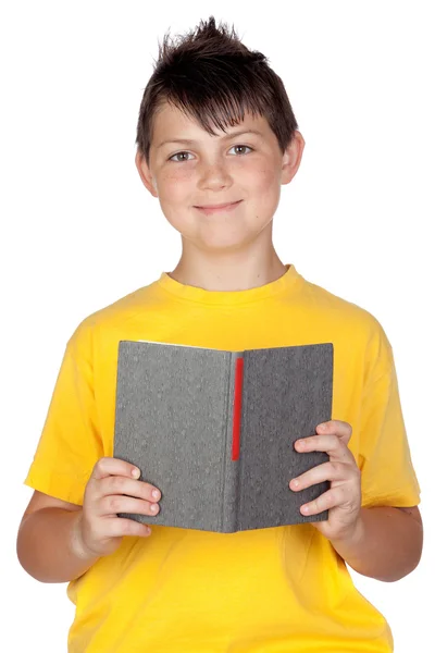 Criança engraçada com leitura de um livro — Fotografia de Stock