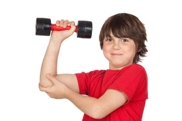 Funny child playing sports with weights — Stock Photo, Image
