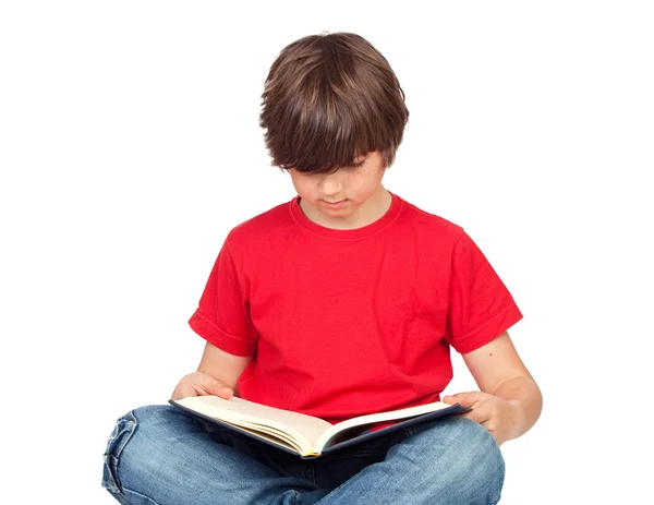 Student barn med en bok — Stockfoto