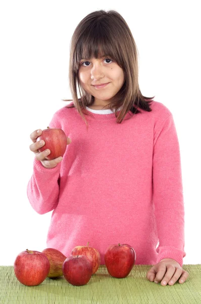 Adorabile ragazza con mele rosse — Foto Stock