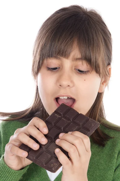 Schattig meisje dat chocolade eet — Stockfoto