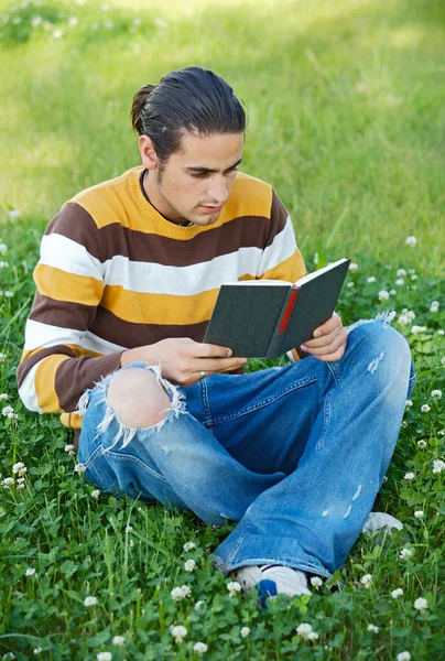 Casual boy reading — Stock Photo, Image