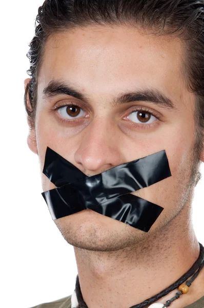 Человек с маскировочной лентой на губах — стоковое фото