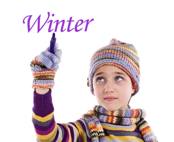 Αξιολάτρευτο μικρό κορίτσι με ρούχα για το χειμώνα γράψιμο — Φωτογραφία Αρχείου
