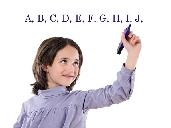 Adorable chica escribiendo el ABC con fluorescente — Foto de Stock