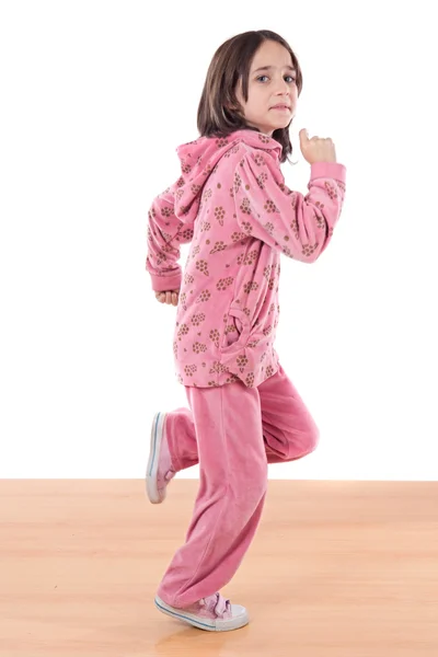 Радісна маленька дівчинка біжить — стокове фото