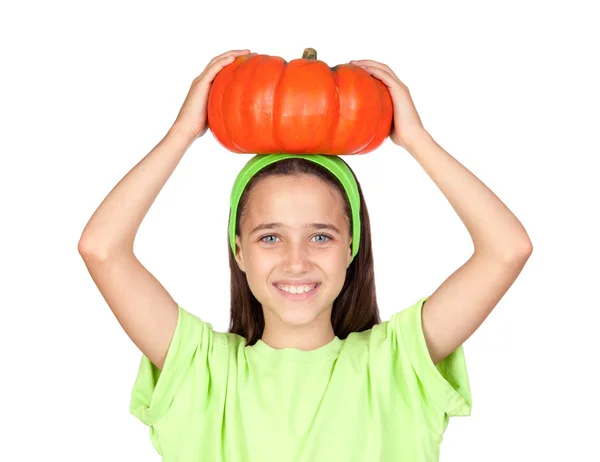 Happy girl in Halloween with a big pumpkin — Stock Photo, Image