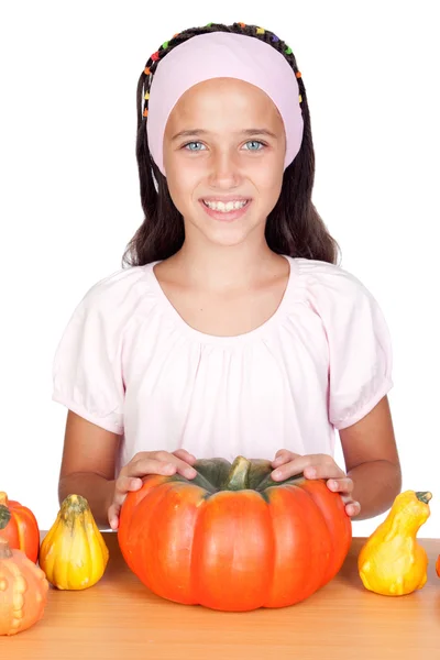 Happy girl in Halloween with a many pumpkins — Stock Photo, Image