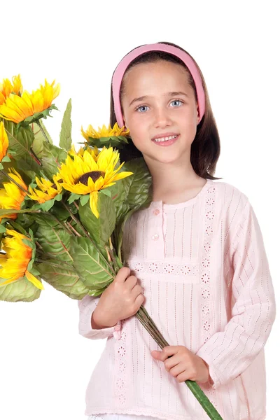 Mooi meisje met een boeket van zonnebloemen — Stockfoto
