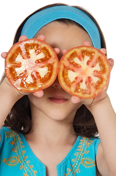 Girl with tomatoes in her eyes — Stock Photo, Image