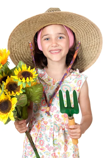 Liten flicka trädgårdsmästare med stråhatt — Stockfoto