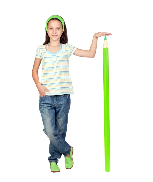 Adorable student girl with a giant green pencil — Stock Photo, Image