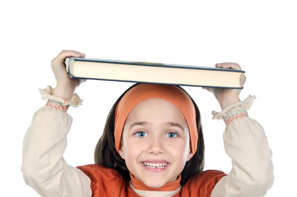 在头上的女孩举行书 — 图库照片