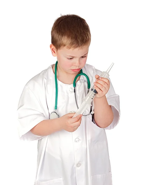 Очаровательный ребенок в форме врача — стоковое фото