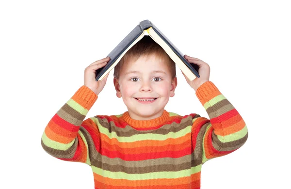 Student child with a books on the head — Stock Photo, Image