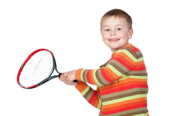 Смешной ребенок с теннисной ракеткой — стоковое фото