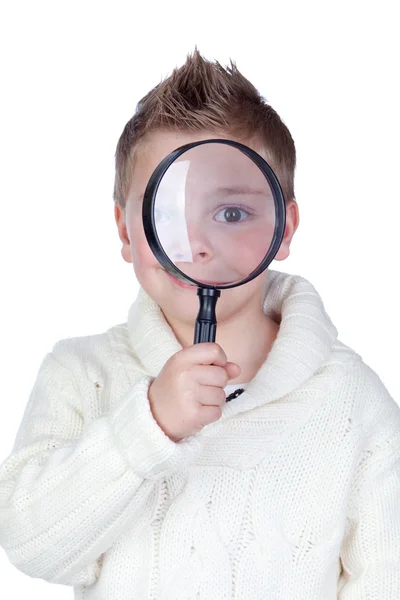 Schattig kind met een vergrootglas — Stockfoto