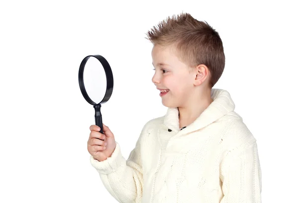 Adorable child with a magnifying glass — Stock Photo, Image