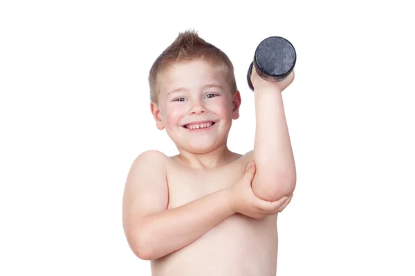 Dünner Junge zeigt seine Muskeln — Stockfoto