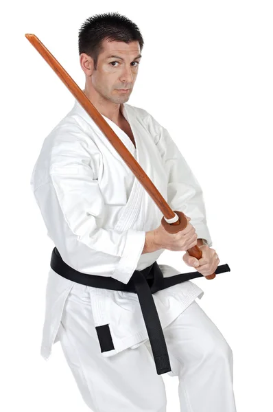 Karate expert with wooden sword — Stock Photo, Image