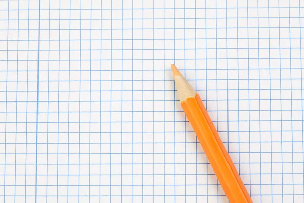 Sharp pencil on a notebook — Stock Photo, Image