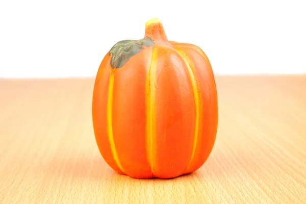 Orange pumpkin on wooden surface — Stock Photo, Image
