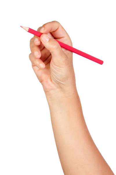 Caucasian hand with red pencil — Stock Photo, Image