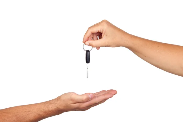 Hand giving car keys — Stock Photo, Image
