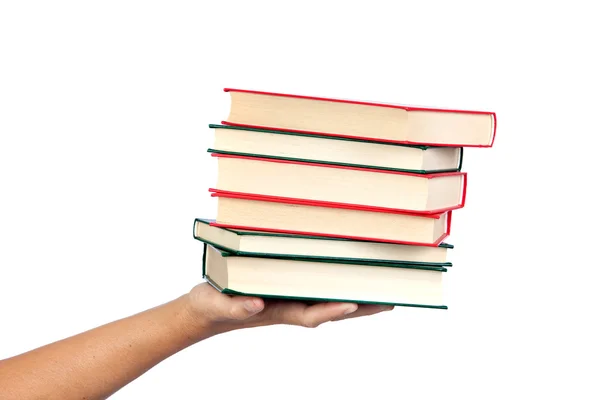 Hand bietet viele Bücher — Stockfoto