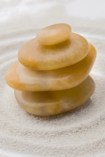 Rocks in equilibrium with sand — Stock Photo, Image