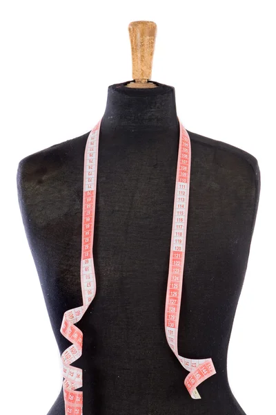 Mannequin with a tape measure — Stock Photo, Image