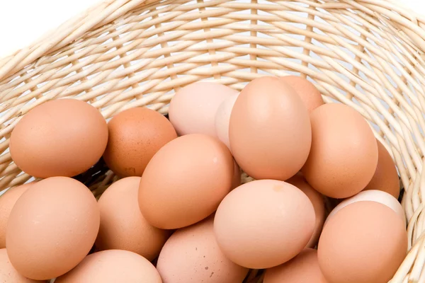 Basket with a lot of hen eggs — Stock Photo, Image