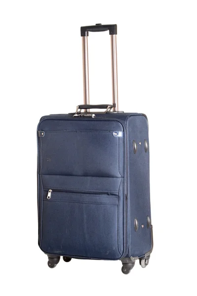 Niebieski walizka na kółkach — Zdjęcie stockowe