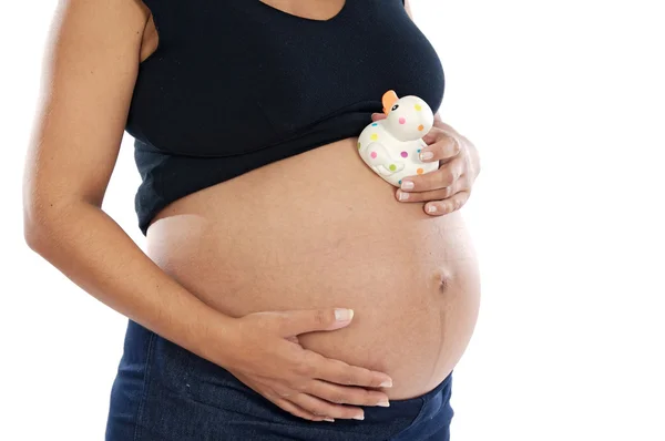 Mujer embarazada con pato de juguete — Foto de Stock