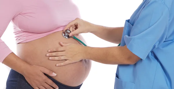 Гинеколог и беременная красавица — стоковое фото