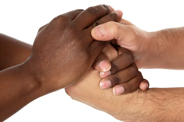 Рукопожатие между расами — стоковое фото