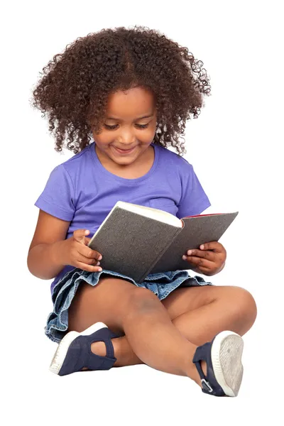 Studente bambina che legge con un libro Fotografia Stock