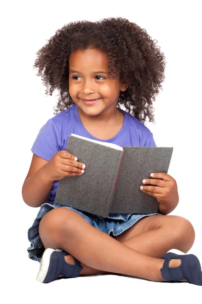 Student little girl reading with a book Stock Photo