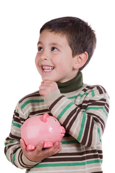 Adorable child thinking what to buy with their savings Stock Picture