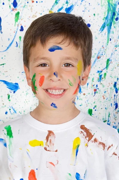 Boy playing with painting Stock Photo