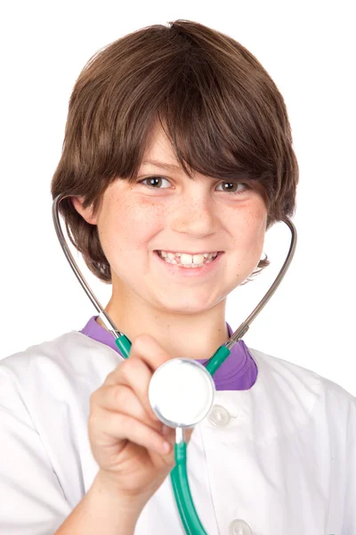 Adorable niño con ropa de médico aislado en blanco Imagen de stock