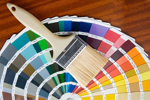 Paintbrush with card of colors Royalty Free Stock Images