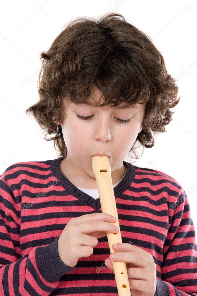 Adorable child playing flute