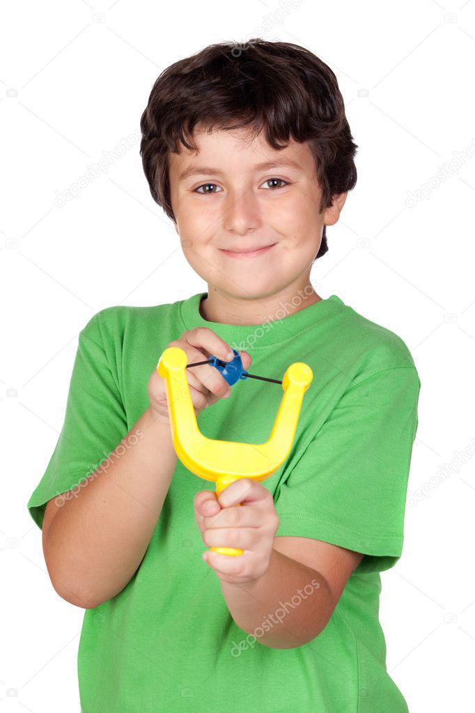 Adorable child with a slingshot