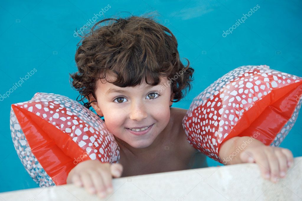 Boy learning to swim — Stock Photo © Gelpi #9433280