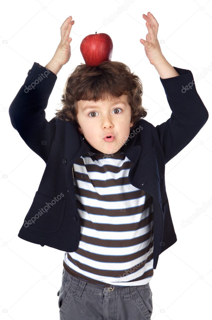 Adorable child with an apple in the head