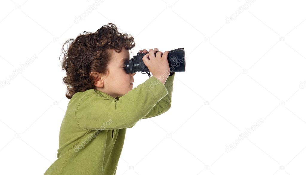 Adorable spy boy with binoculars