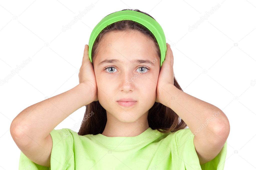 Frightened girl with ears plugged