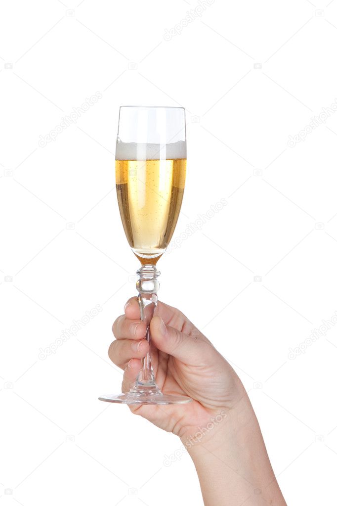 Hand holding glass of champagne
